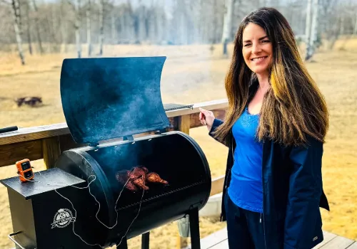 Jeri Walker of Winding Creek Ranch fires up the grill in Alberta.